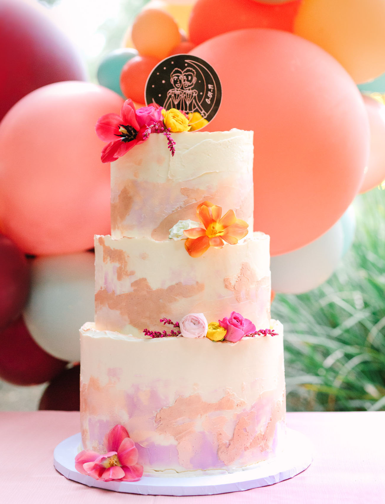The wedding cake was a bright watercolor one, with brushstrokes and bright blooms