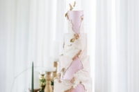 12 The wedding cake was done in pink and white, with plenty of texture and rose gold florals