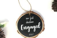 17 a pretty chalkboard wood slice Christmas ornament is a stylish idea for a newly engaged couple