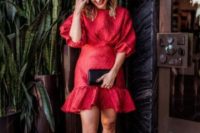 18 a short red dress with long puff sleeves, a high neckline, a playful skirt and nude shoes and a black clutch