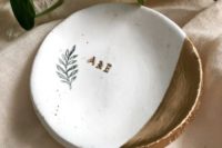 18 a speckled minimalist ring dish with a copper part and initials is a very chic modern idea to go for