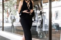 20 a super chic black sheath maxi dress with a cold shoulder and a lace up front plus gorgeous booties