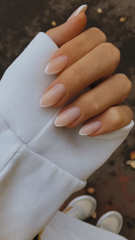 a French manicure on stiletto nails is a very cool and fresh idea that looks up-to-date and cool