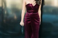 a burgundy velvet midi dress with a unique layered neckline, white strappy heels and a clutch