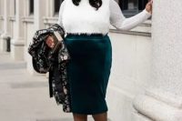 a chic look with an emerald velvet midi, a white top with a feather front and black shoes plus a bold printed coat