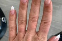 a modern take on a French manicure is a stylish and cool solution for a bride, it looks unusual on long nails