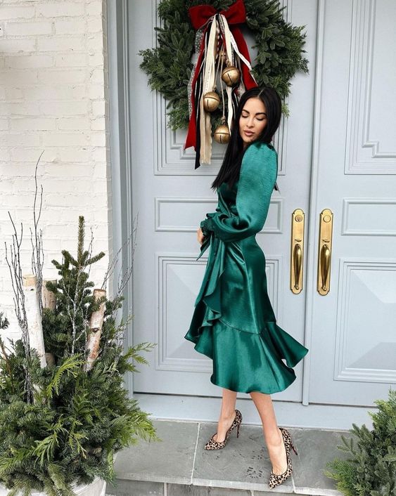 an exquisite green midi wrap dress, leopard shoes are a cool combo for a Christmas wedding, it looks chic