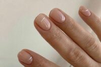 beautiful nude wedding nails with silver stripes are a trendy and modern solution for a bride
