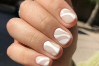 blush and white nails with abstract patterns are an amazing idea of a wedding spring manicure and will fit many other weddings, too