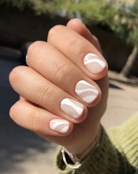 blush and white nails with abstract patterns are an amazing idea of a wedding spring manicure and will fit many other weddings, too