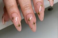 long dusty pink wedding nails with gold stars and polka dots are amazing for a celestial wedding, they will be great for a celestial bride