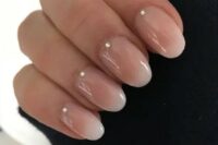 ombre French nails with little rhinestones is a chic and modern idea for an edgy bride