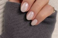 pearl wedding nails of an almond shape are amazing for a delicate and girlish look at the wedding