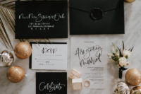 a wedding stationary in black and white tones