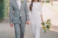 02 a casual plain sheath wedding dress with a high neckline, long sleeves and neutral heels to finish off the look