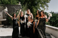 03 The bridesmaids were wearing elegant mismatching black maxi dresses