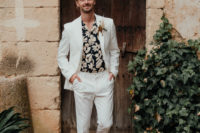 04 The groom was wearing a white suit, a dark floral shirt and brown moccasins for a relaxed boho look