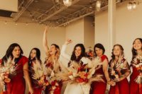04 deep red jumpsuits with cap sleeves and wideleg pants and white platform shoes for boho bridesmaids