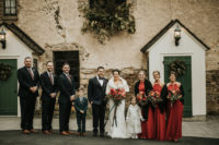 05 The groomsmen were wearing grey suits with plaid ties and the bridesmaids were wearing red halter neckline maxi dresses