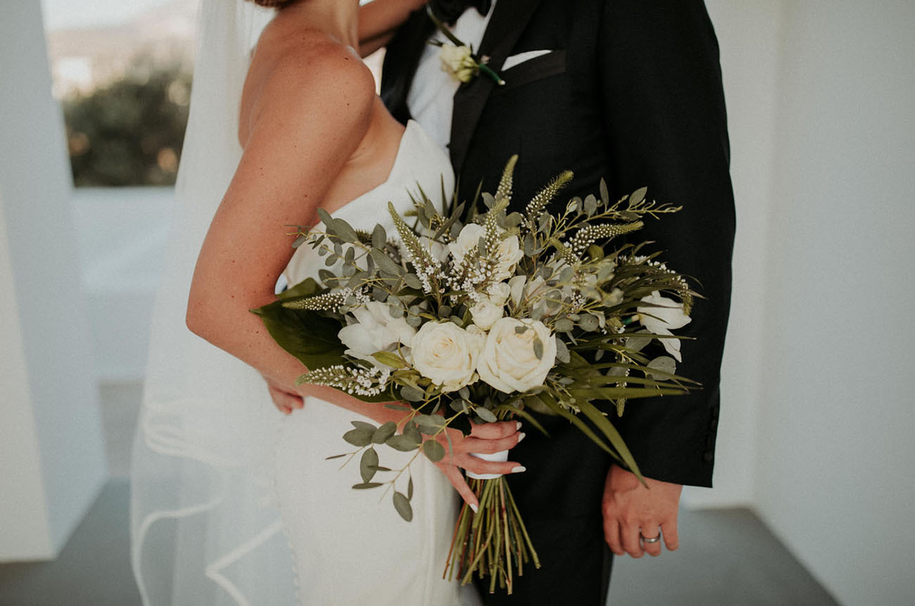 The wedding bouquet was done in neutrals and textural greenery
