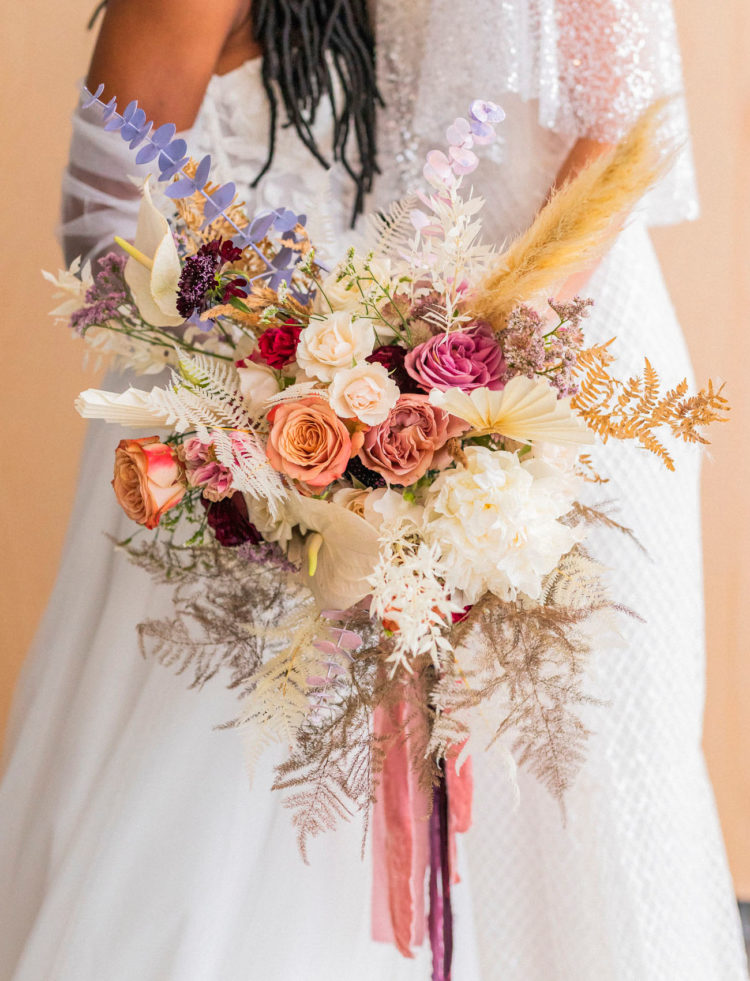The wedding bouquet was spectacular, in peachy, pink, neutrals and purple