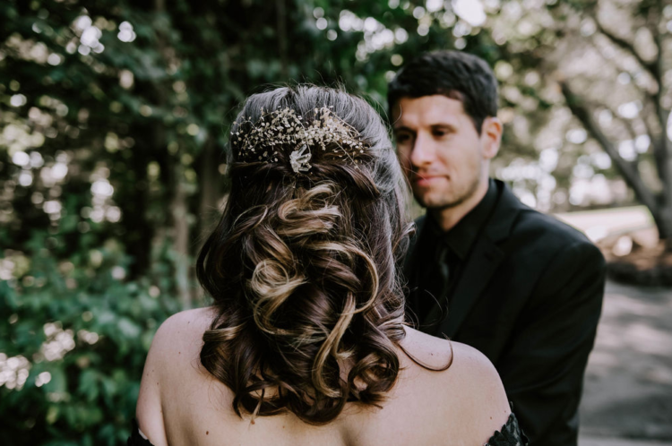 The bridal hair was a half updo with a chic crystal headpiece