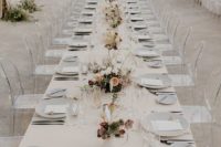 09 a neutral wedding table with neutral and pastel blooms, greenery and lilac plates with gold rims