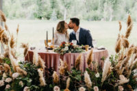 10 The sweetheart table was accented with the wedding altar for a chic look
