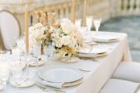 10 a neutral wedding tablescape with neutral and dried blooms, beige candles and much texture