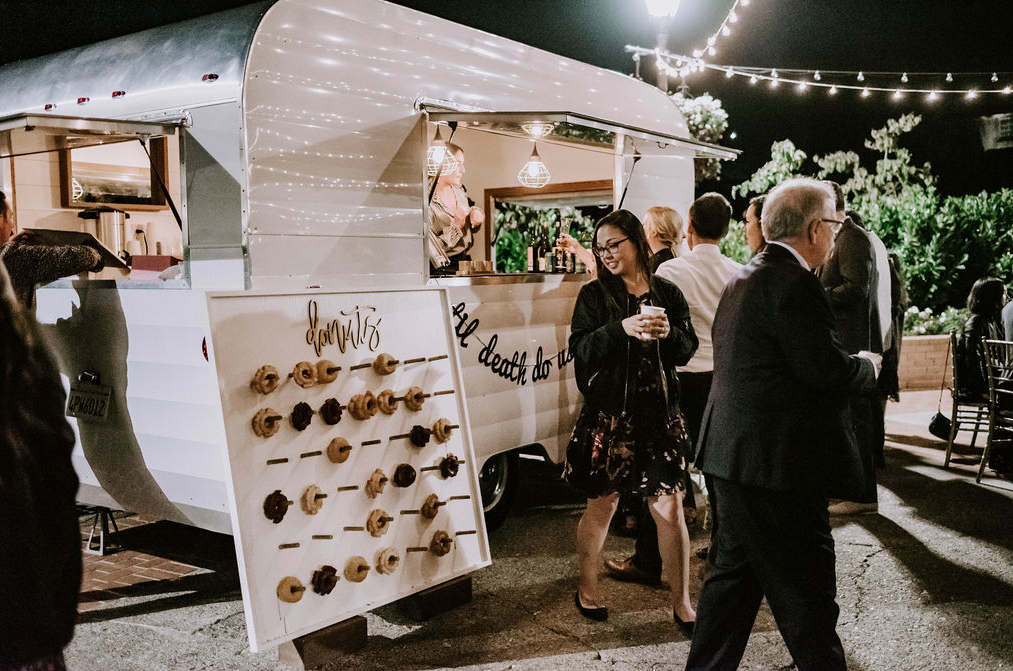 There was a trendy donut wall to skip a traditional wedding cake