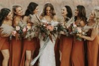 12 rust-colored high low bridesmaid dresses with spaghetti straps and nude shoes for a trendy look