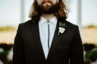 13 a bolo tie for the groom is a great idea to add a slight Western feel to the wedding without going too far