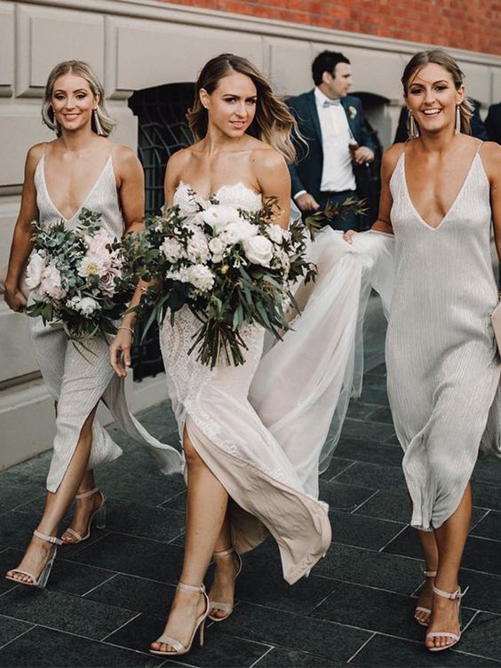 gorgeous embellished white bridesmaid slip dresses with side slits and nude shoes