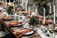 13 spruce up the tablescape with chic rust blooms and rust-colored napkins to give it an edge