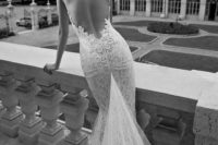 14 a lace mermaid wedding dress with no back and a long train is gorgeous and luxurious