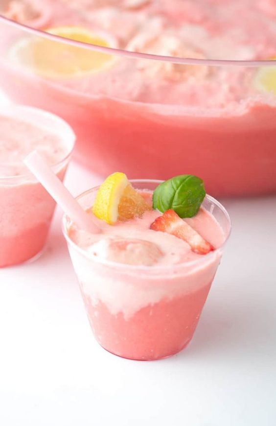 serve some pink strawberry sherbet punch with lemon and basil to refresh your guests