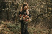 34 a gorgeous black lace embellished wedding dress with a long train for a Halloween wedding