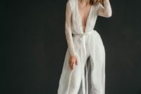 36 a fantastic lace bridal jumpsuit with long sleeves and a plunging neckline plus an overskirt and red shoes