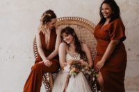 36 mismatching terracotta bridesmaid dresses with various designs, cuts and lengths are cool