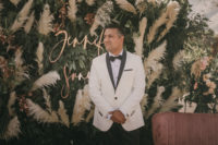 03 The groom was rocking a white tux with black lapels