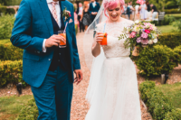 03 The groom was wearign a bright blue suit with a navy waistcoat and a colorful floral tie