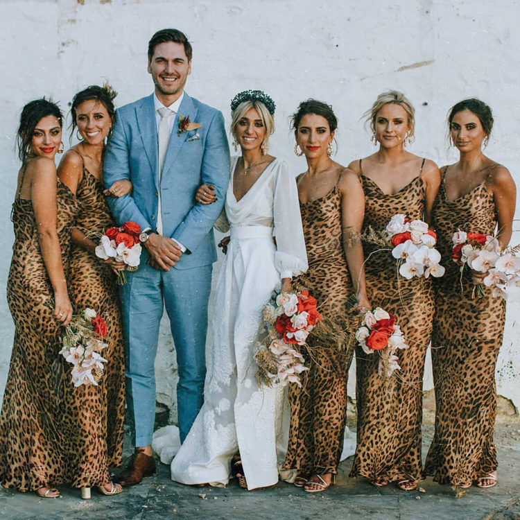 matching leopard print bridesmaid dresses on psaghetti straps are chic and cool