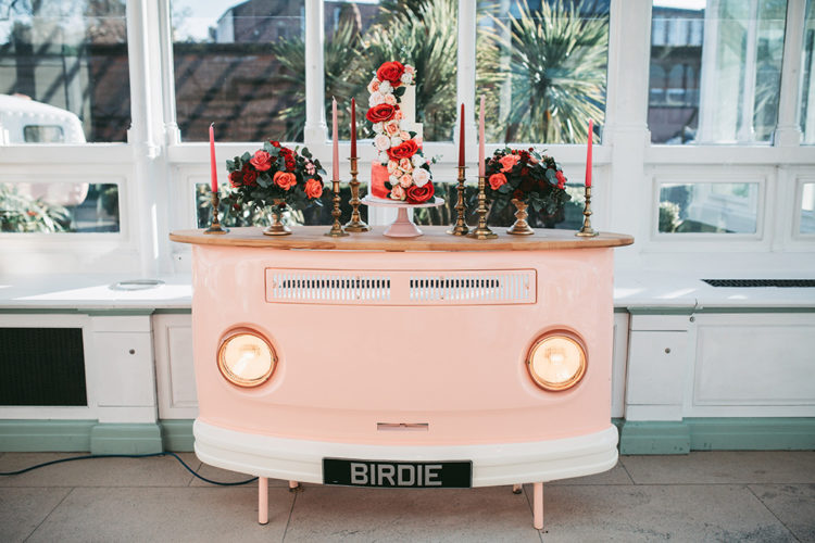 The wedding cake bar was a pink one, styled as a retro van, red and pink candles and a gorgeous cake