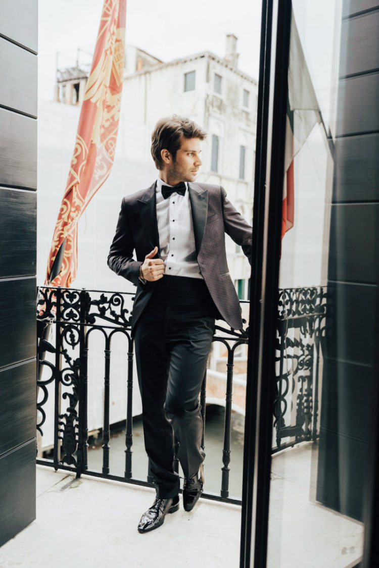 A classic tux but with a printed blazer is a chic and refined idea for a groom