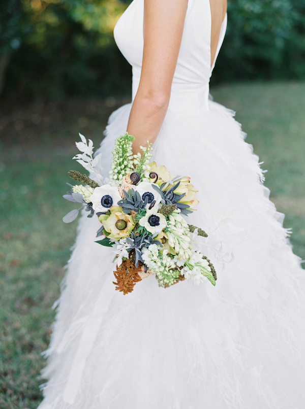 The first bridal bouquet was done with white anemones, yellows, greenery and some dried touches