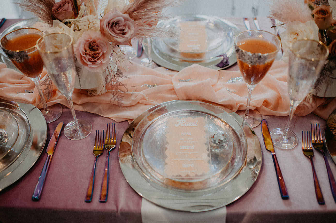The table was styled with silver plates, disco balls, silver cutlery and gold rim glasses plus a mauve tablecloth