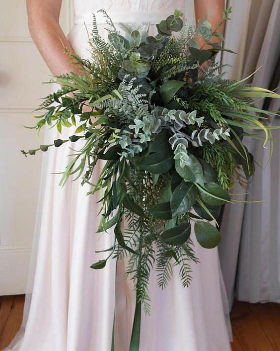 a greenery wedding bouquet with plenty of texture is a creative idea to get a stunning bouquet and not to waste money