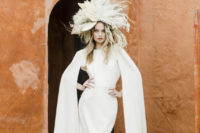 10 The second wedding dress was minimalist, with cape sleeves and a statement dried flower crown
