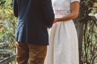 10 a romantic lace two piece wedding dress with a high low midi skirt and a crop top is ideal for a boho bride