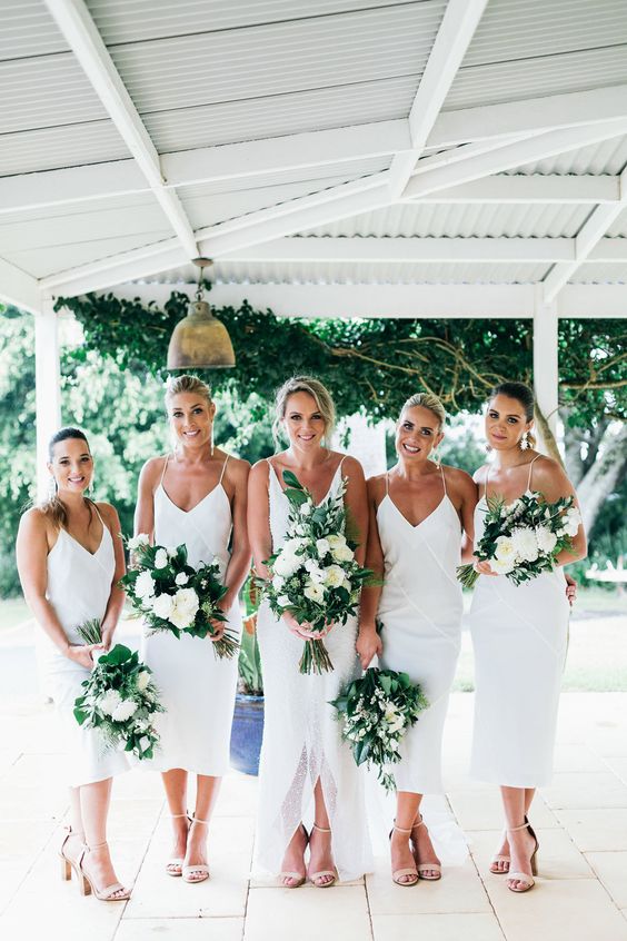 white slip midi bridesmaid dresses plus nude shoes are a cool and chic combo